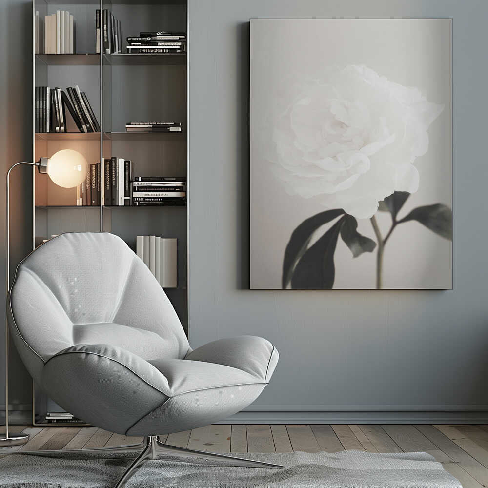 A close-up photograph of a delicate white peony flower with dark leaves against a light, neutral background.