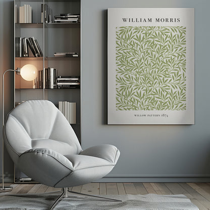 A framed art print of William Morris's 'Willow Pattern 1874'. The print features an intricate, repeating pattern of green willow branches and leaves on an off-white background, with the artist's name and pattern title in black text above and below the design. Print