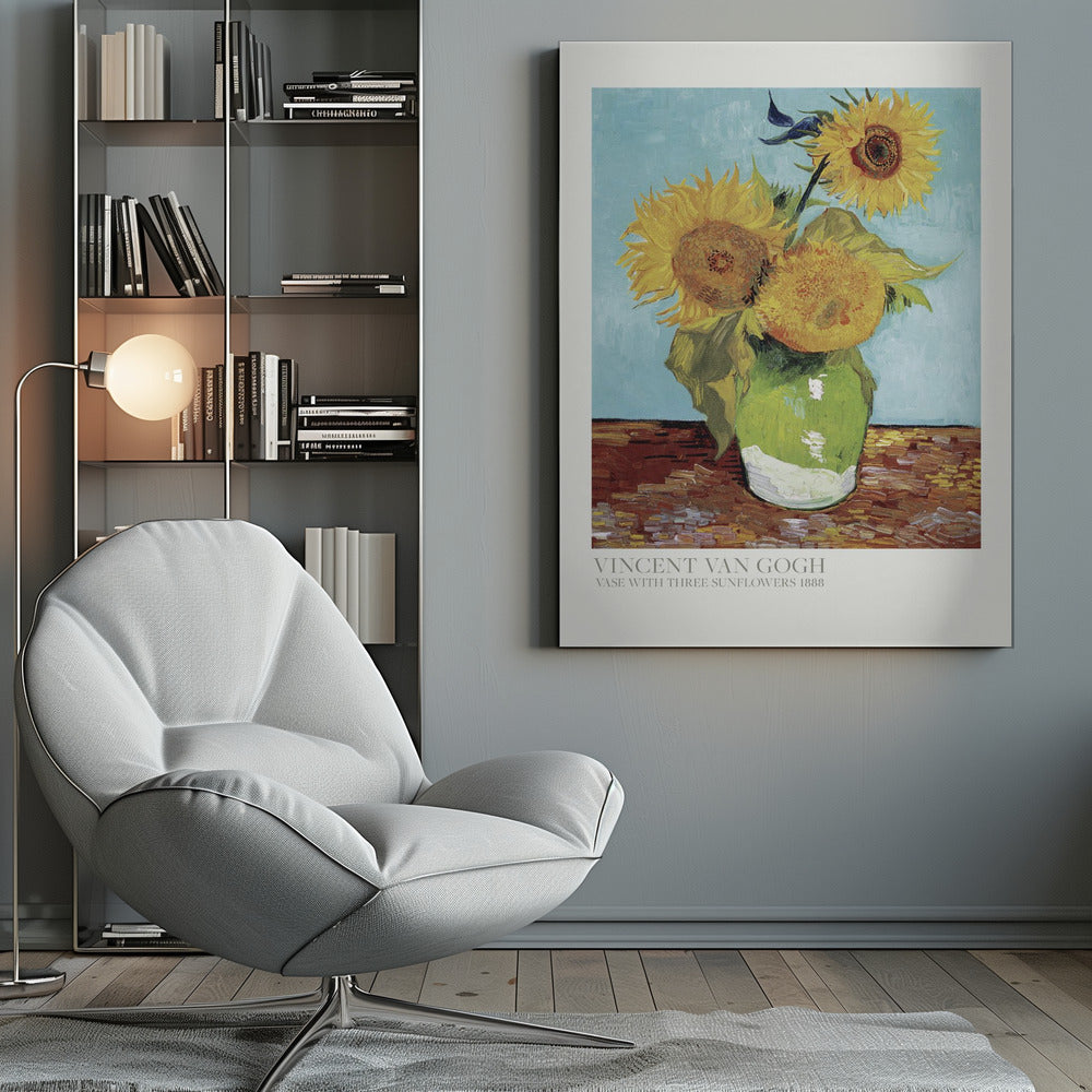 A framed art print of Vincent van Gogh's painting 'Vase with Three Sunflowers' from 1888. The artwork features three large, vibrant yellow sunflowers in a green vase set against a textured light blue background. The painting is in the post-impressionist style with thick, visible brushstrokes. The print has a white border with text at the bottom identifying the artist and title. Print