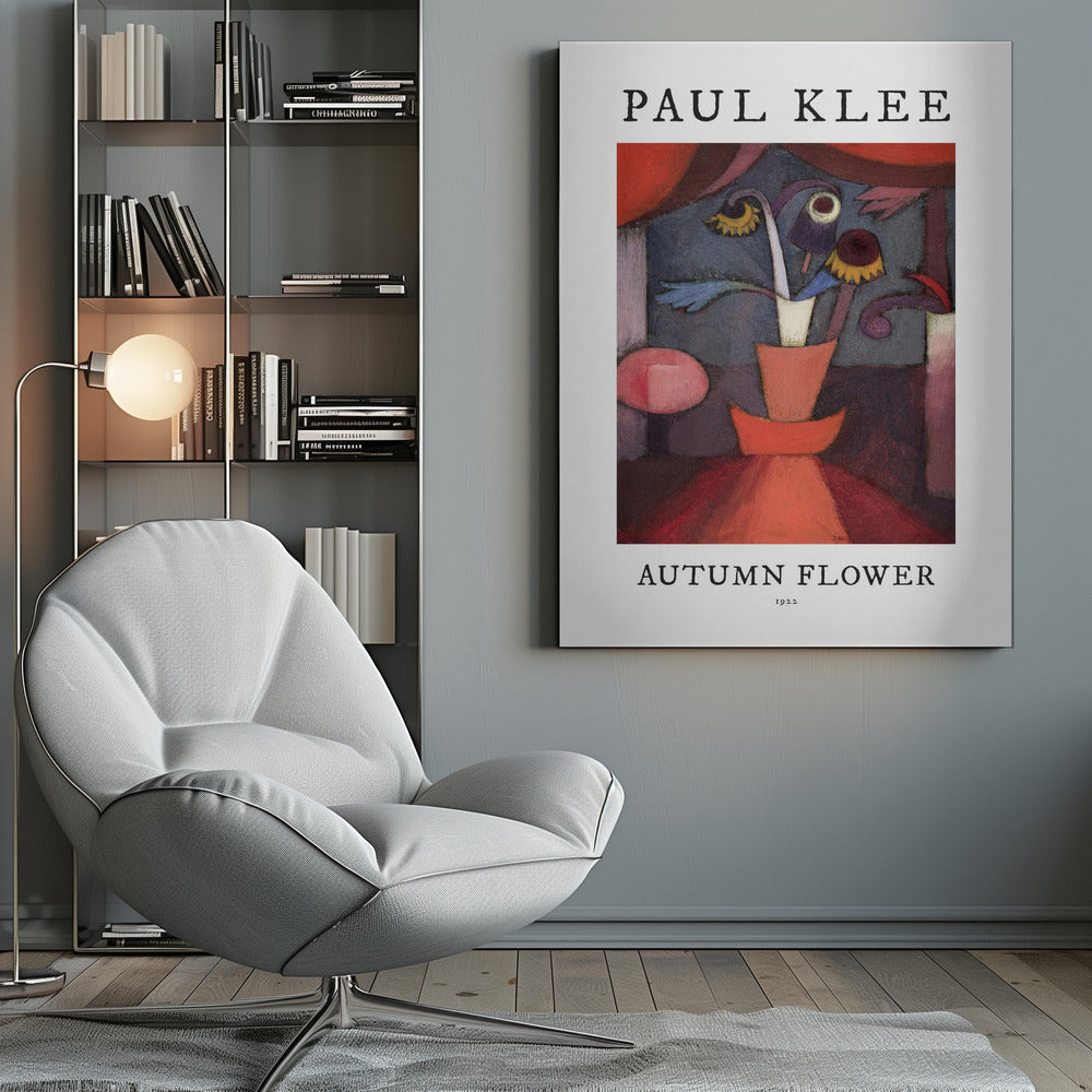 A poster of Paul Klee's 1922 painting 'Autumn Flower'. The abstract artwork features a stylized vase with surreal flowers in shades of red, orange, blue, and purple. The poster has a white border with 'PAUL KLEE' at the top and 'AUTUMN FLOWER 1922' at the bottom, all within a thin black frame. Poster