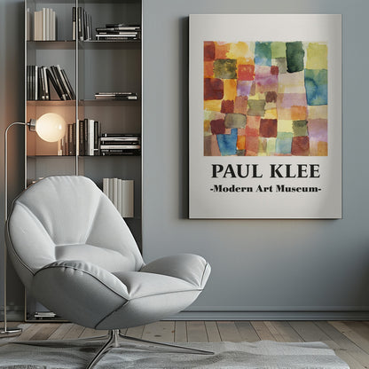 A framed museum poster for a Paul Klee exhibition at the Modern Art Museum. The poster features an abstract watercolor painting composed of a grid of colorful, overlapping squares and rectangles in shades of red, orange, yellow, green, and blue. Decor