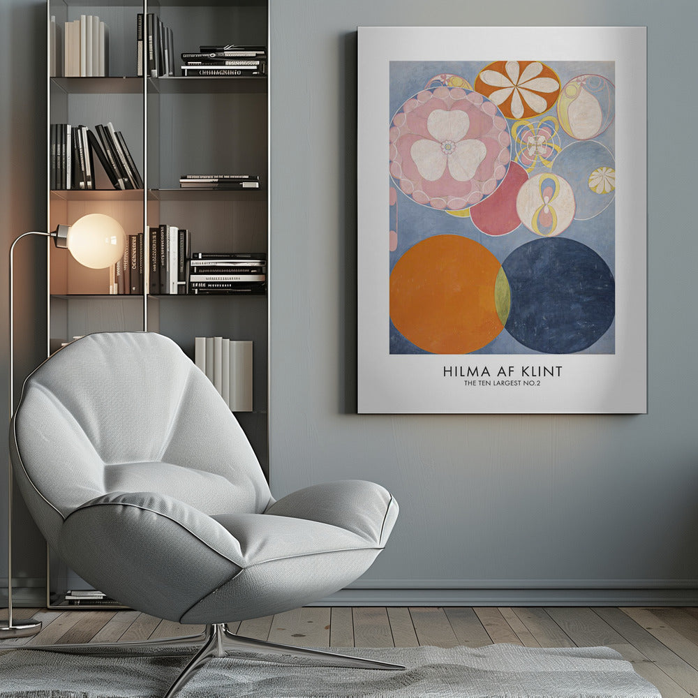 A poster of Hilma af Klint's abstract painting 'The Ten Largest, No. 2'. The artwork features a variety of colorful circles and floral-like motifs on a light blue background, with dominant colors of pink, orange, and dark blue. The artist's name and artwork title are printed below. Artwork
