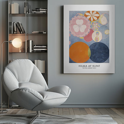 A poster of Hilma af Klint's abstract painting 'The Ten Largest, No. 2'. The artwork features a variety of colorful circles and floral-like motifs on a light blue background, with dominant colors of pink, orange, and dark blue. The artist's name and artwork title are printed below. Artwork
