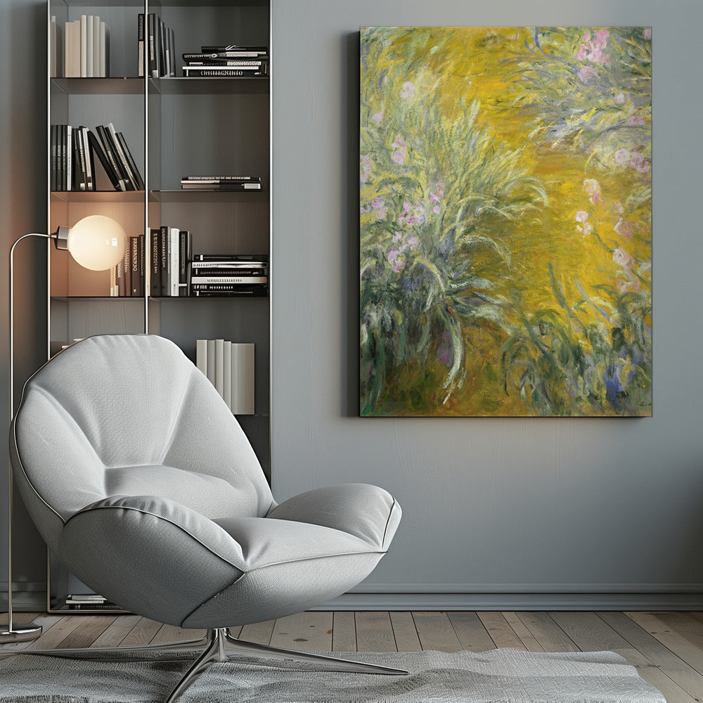 An Impressionist painting by Claude Monet of a sunlit garden, possibly Giverny. The canvas is filled with energetic brushstrokes depicting tall green leaves and soft pink irises against a vibrant, almost abstract background of golden yellow. Print