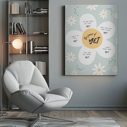 An inspirational poster in a black frame with a light green background and scattered daisy flowers. A large central daisy has 'The power of YET' in its yellow center. Each of its five white petals displays a negative self-talk phrase, such as 'I can't do this..' or 'I'm not good at this..', followed by the word 'YET' in bold, promoting a growth mindset. Print