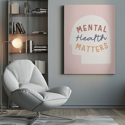 An inspirational art print with a light pink background featuring a cream-colored silhouette of a human head. Inside the silhouette, the phrase 'MENTAL Health MATTERS' is written in three different colors and fonts: rust red, slate blue script, and light orange. Wall Art