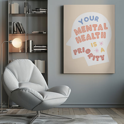 An inspirational art print with a beige background featuring a white silhouette of a head. Inside the silhouette, the phrase 'Your mental health is a priority' is written in a playful, multi-colored block font. Wall Art