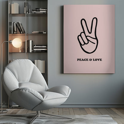 A minimalist art print with a light pink background featuring a bold black outline of a hand making a peace sign. Below the hand, the words 'PEACE & LOVE' are printed in a black serif font. The print is enclosed in a simple black frame. Print