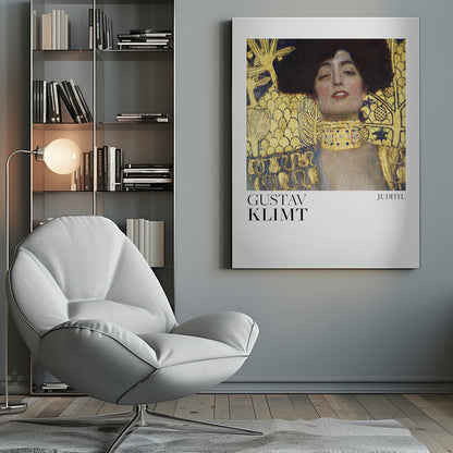 A framed art print of Gustav Klimt's painting 'Judith I'. The artwork features a portrait of a woman with dark hair and a gold choker against a lavish gold-leaf background. The artist's name and the title 'JUDITH.' are printed below the image on a white border. Print
