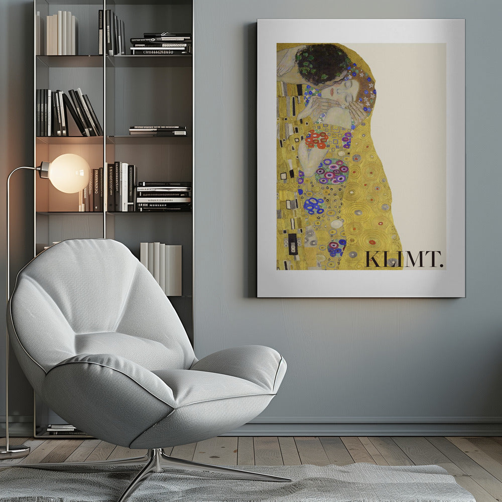 A framed art print of Gustav Klimt's 'The Kiss'. A couple embraces in ornate golden robes against a shimmering gold background. The poster includes the artist's name 'KLIMT.' in the lower right. Decor