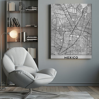 A modern, minimalist black and white art print of a street map of Mexico City, enclosed in a simple black frame. The intricate road network is depicted with black lines on a textured white background. The word 'MEXICO' is printed in bold, black capital letters at the bottom. Print