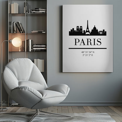 A minimalist black and white poster in a black frame. It features a black silhouette of the Paris skyline, including the Eiffel Tower and Notre Dame. Below the city is the word 'PARIS' in a large serif font, followed by its geographical coordinates. Poster