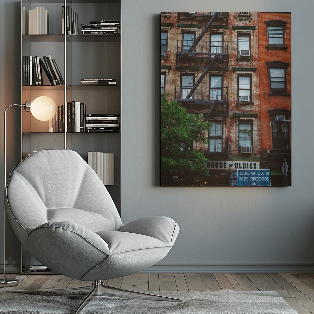 A classic multi-story brick apartment building with a prominent black metal fire escape zigzagging across its facade. A sign for a 'House of Oldies' rare records shop is visible on the ground floor. Poster