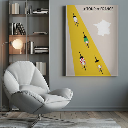 A minimalist poster for Le Tour de France featuring an overhead view of four cyclists on a bright yellow road that cuts diagonally across a beige background. The cyclists wear the iconic white, green, red polka-dot, and yellow jerseys. The title 'LE TOUR de FRANCE' is at the top, and a white silhouette of the map of France is in the upper right corner. Print