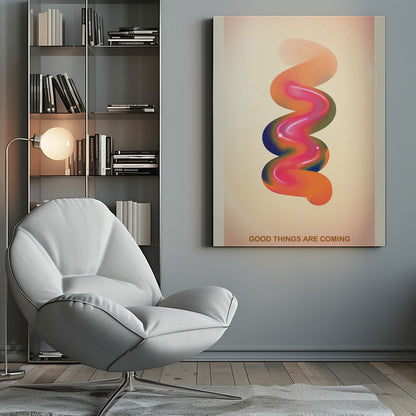 A framed modern art poster with a cream-colored, textured background. In the center is a glossy, 3D spiral shape with a vibrant color gradient of pink, orange, blue, and green. At the bottom, the motivational phrase 'GOOD THINGS ARE COMING' is printed in a simple, orange-brown font. Decor