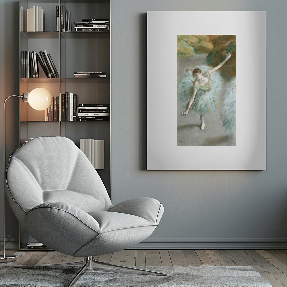 A framed vertical reproduction of an Edgar Degas painting showing a ballerina from a high angle. She wears a voluminous light blue tutu and is posed gracefully with arms outstretched against a soft, impressionistic background of earthy browns and tans. Poster