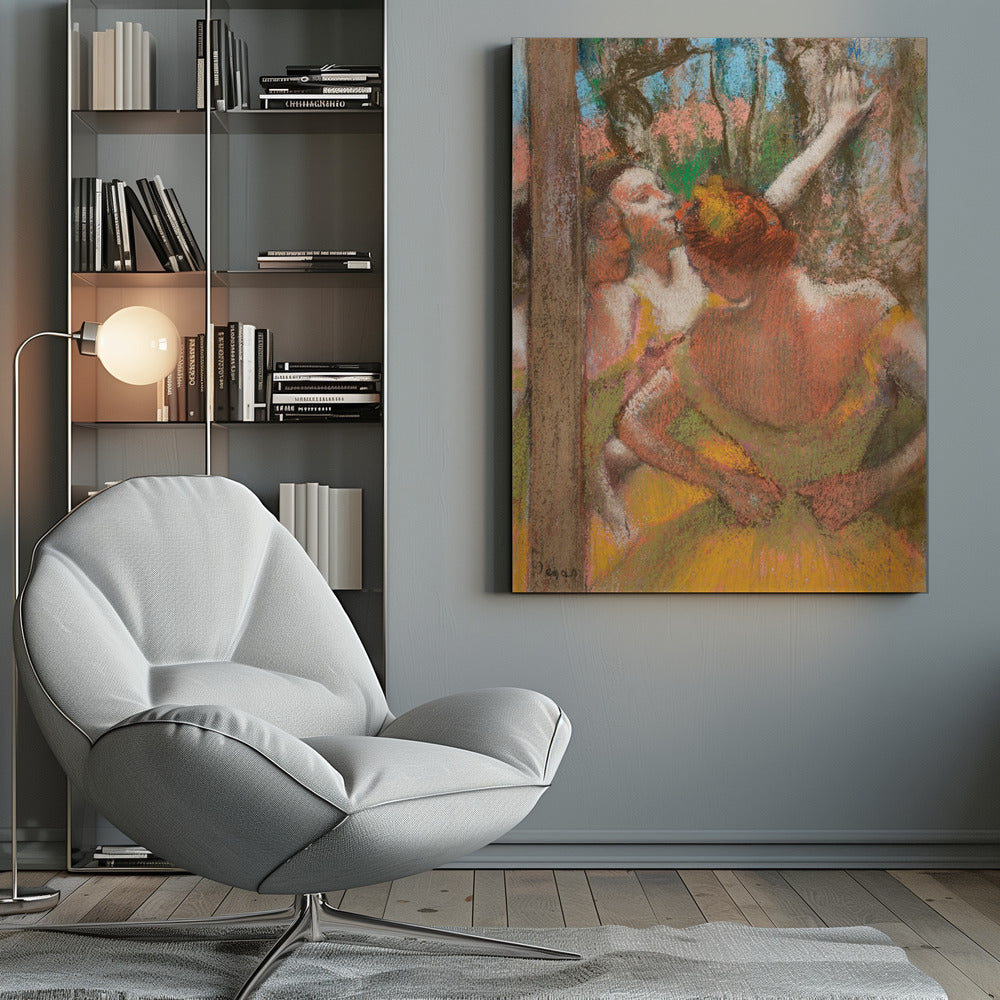 An Impressionist pastel drawing by Edgar Degas depicting several ballet dancers backstage. A dancer with reddish-orange hair is seen from behind in a yellow-green costume, while another dancer stretches an arm upwards. The background is a textured blend of blue, pink, and green. Decor