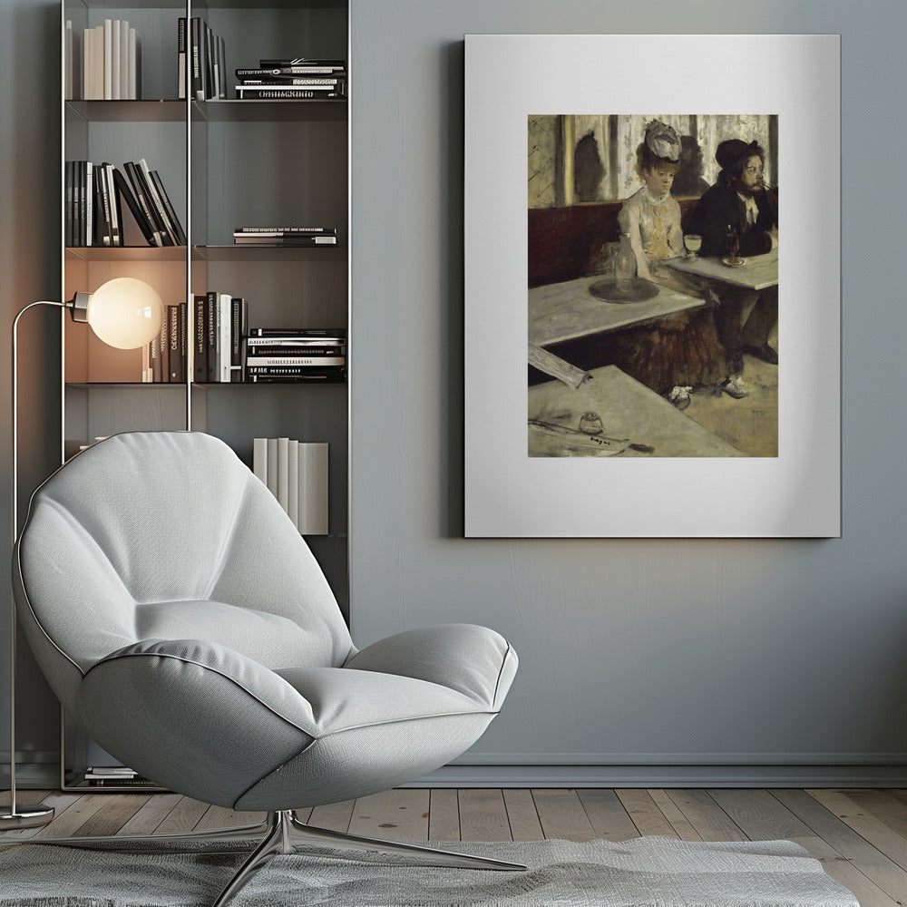 A framed print of Edgar Degas's painting 'L'Absinthe,' depicting a somber-looking man and woman sitting at adjacent tables in a 19th-century Parisian cafe, conveying a sense of alienation and melancholy. Print