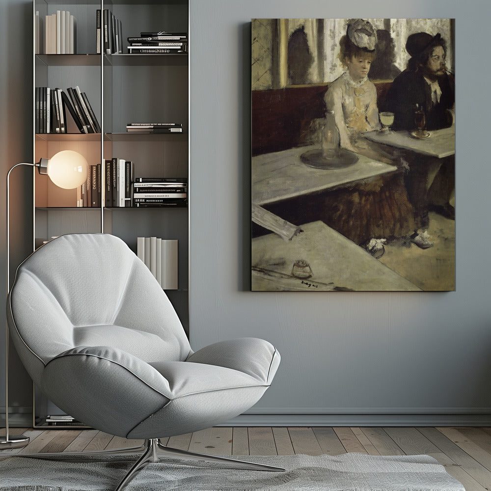 An impressionist painting by Edgar Degas, 'L'Absinthe', depicting a man and a woman sitting separately in a cafe. The woman in a light dress and hat looks downcast before a glass of pale green absinthe, while the bearded man next to her smokes a pipe and looks to the right. The scene is captured from an angle, with empty cafe tables in the foreground. Poster