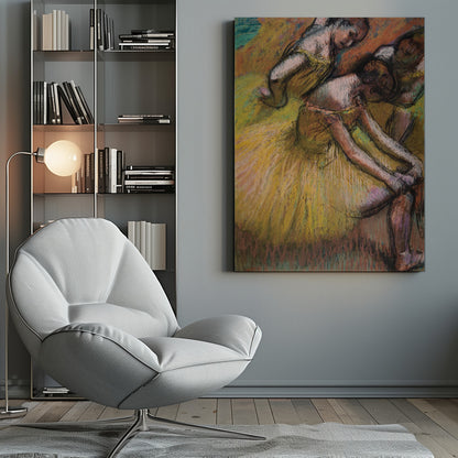 An impressionist pastel drawing of three ballet dancers in yellow tutus. One dancer is in the foreground, bent over to adjust her shoe, while two others are in the background. The artwork features a warm color palette with energetic, visible strokes. Decor