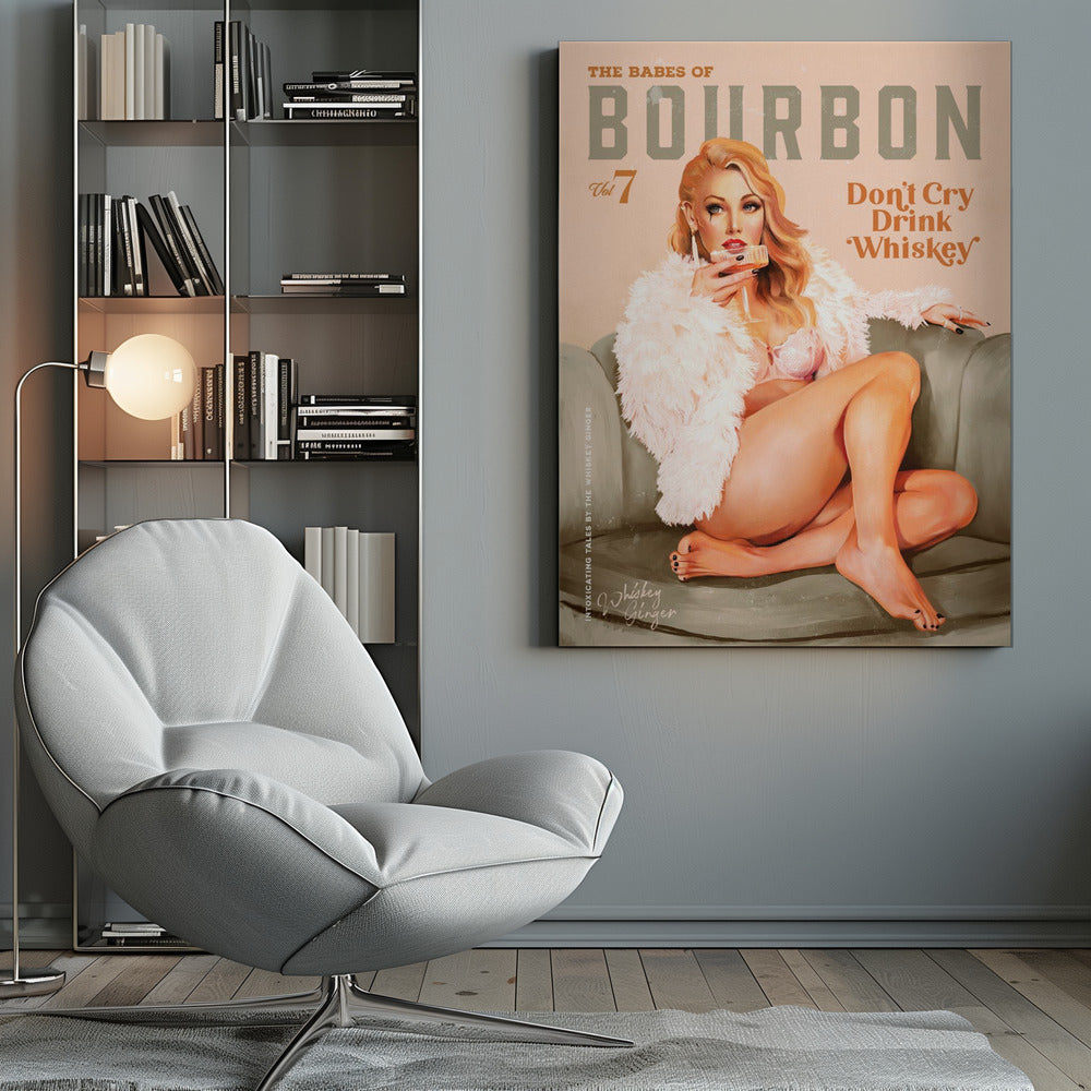 A vintage-style pin-up poster titled 'The Babes of Bourbon, Vol 7'. A glamorous blonde woman in a pink bra and fluffy white coat lounges on a gray-green sofa, holding a glass of whiskey. The poster also has the text 'Don't Cry Drink Whiskey'. Wall Art