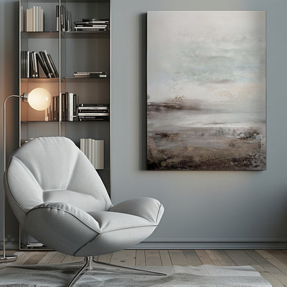 A vertical abstract painting in a thin black frame, featuring a muted and serene color palette. The composition resembles a misty landscape, with a light, off-white and pale blue-gray sky transitioning into a textured foreground of beige, brown, and taupe horizontal brushstrokes. Poster