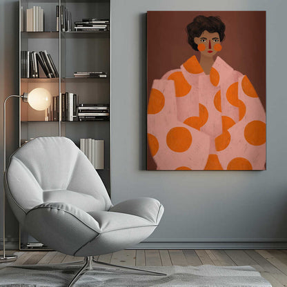 A stylized portrait illustration of a person with dark curly hair and warm brown skin against a solid reddish-brown background. They wear a light pink, oversized coat with large orange polka dots, and look directly forward with a neutral expression, accented by red lipstick and circular orange blush. Decor