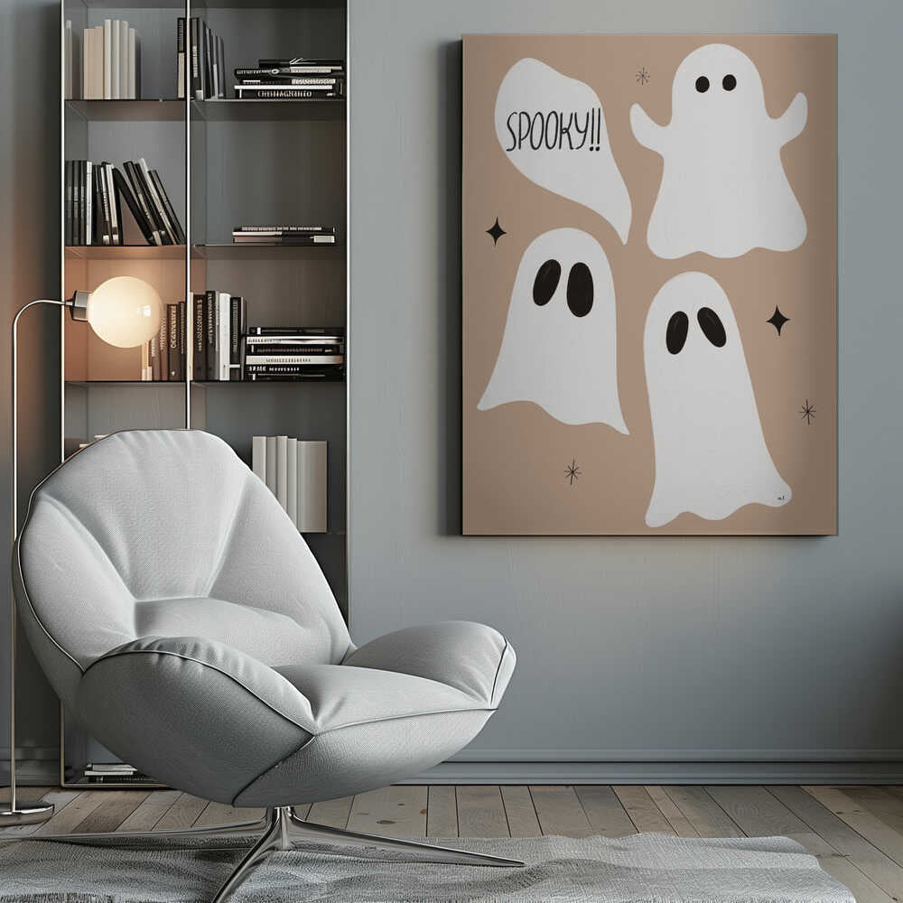 A playful illustration for Halloween featuring three cute, cartoonish white ghosts with black eyes against a solid light brown background. One ghost is accompanied by a speech bubble that reads 'SPOOKY!!' in a hand-drawn font. Small black stars and asterisks are scattered around the ghosts. The artwork is enclosed in a thin black frame. Decor