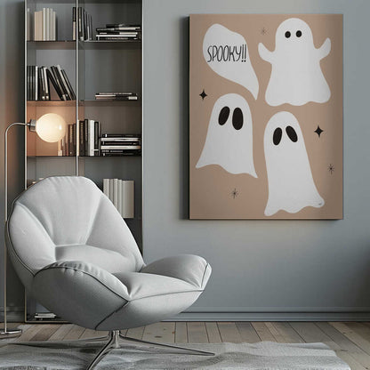 A playful illustration for Halloween featuring three cute, cartoonish white ghosts with black eyes against a solid light brown background. One ghost is accompanied by a speech bubble that reads 'SPOOKY!!' in a hand-drawn font. Small black stars and asterisks are scattered around the ghosts. The artwork is enclosed in a thin black frame. Decor