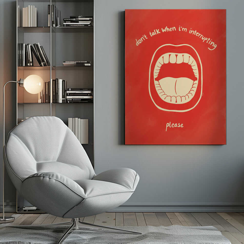 A humorous framed poster with a red background featuring a cream-colored line drawing of a large, open mouth. Above the mouth, the text reads 'don't talk when i'm interrupting' in an arch, and below it says 'please'. Print