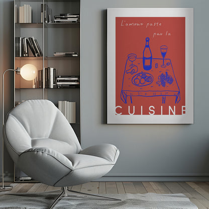 A vintage-style poster with a red background featuring a blue line drawing of a dinner table set with wine and fruit. Above the image is the French phrase 'L'amour passe par la' in white cursive script, and below is the word 'CUISINE' in a bold white font, completing the saying 'Love passes through the kitchen'. Wall Art
