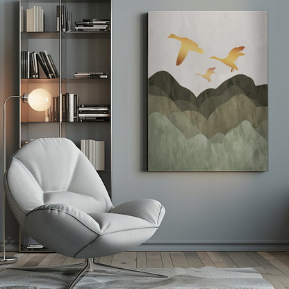A minimalist art print of three golden bird silhouettes flying over a stylized landscape of layered mountains in muted shades of green and brown, set against a light grey, textured sky and enclosed in a thin black frame. Print