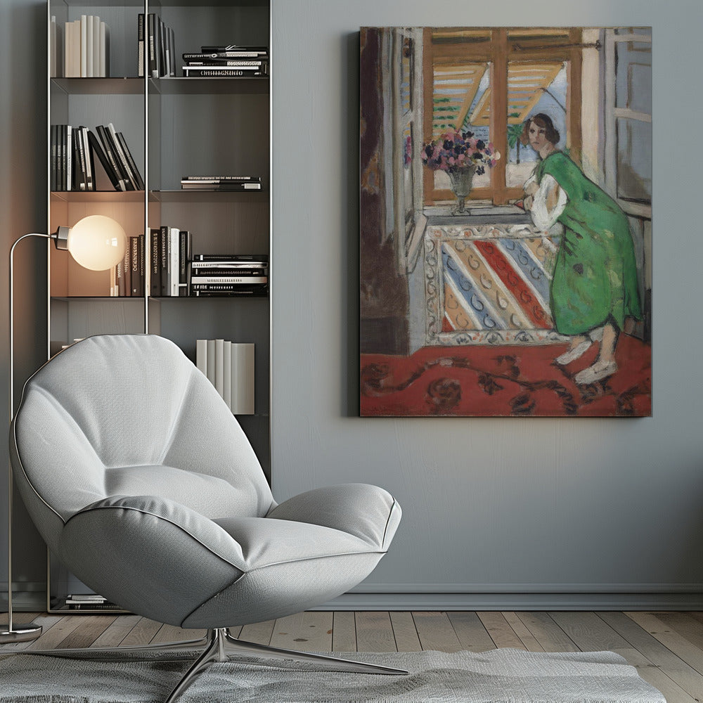 A painting by Henri Matisse depicting a woman in a loose green dress leaning on a windowsill and looking towards the viewer. Outside the open window with tan shutters, a sunny scene with a palm tree is visible. A vase of flowers sits on the sill above a colorful striped panel, and a red patterned rug covers the floor. Print