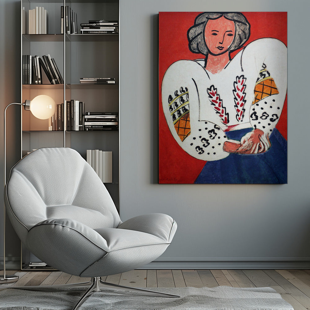 A colorful Fauvist painting by Henri Matisse depicting a woman with dark hair against a bold red background. She is wearing a traditional white Romanian blouse with voluminous, patterned sleeves and a blue skirt, with her hands clasped in her lap. Wall Art