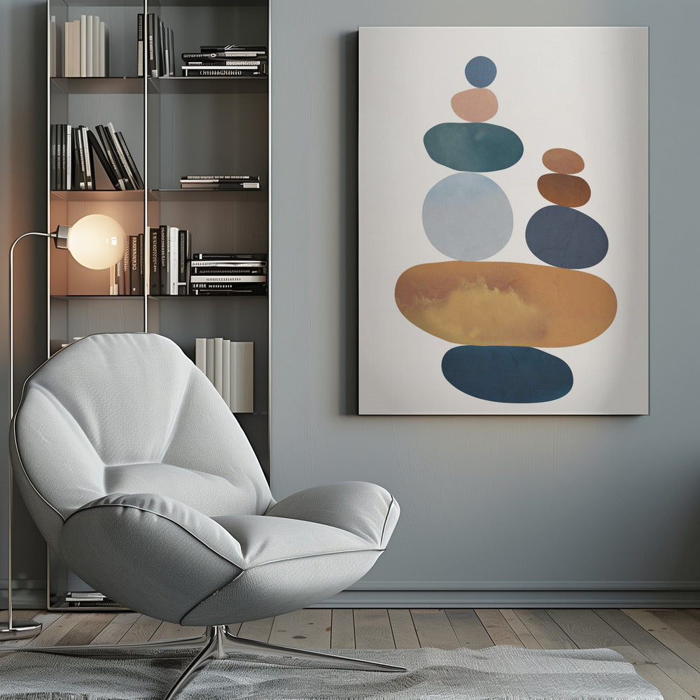A minimalist abstract painting of two stacks of colorful, smooth stones balanced on top of each other. The color palette includes shades of blue, orange, brown, and pink against a light-colored background, enclosed in a black frame. Print