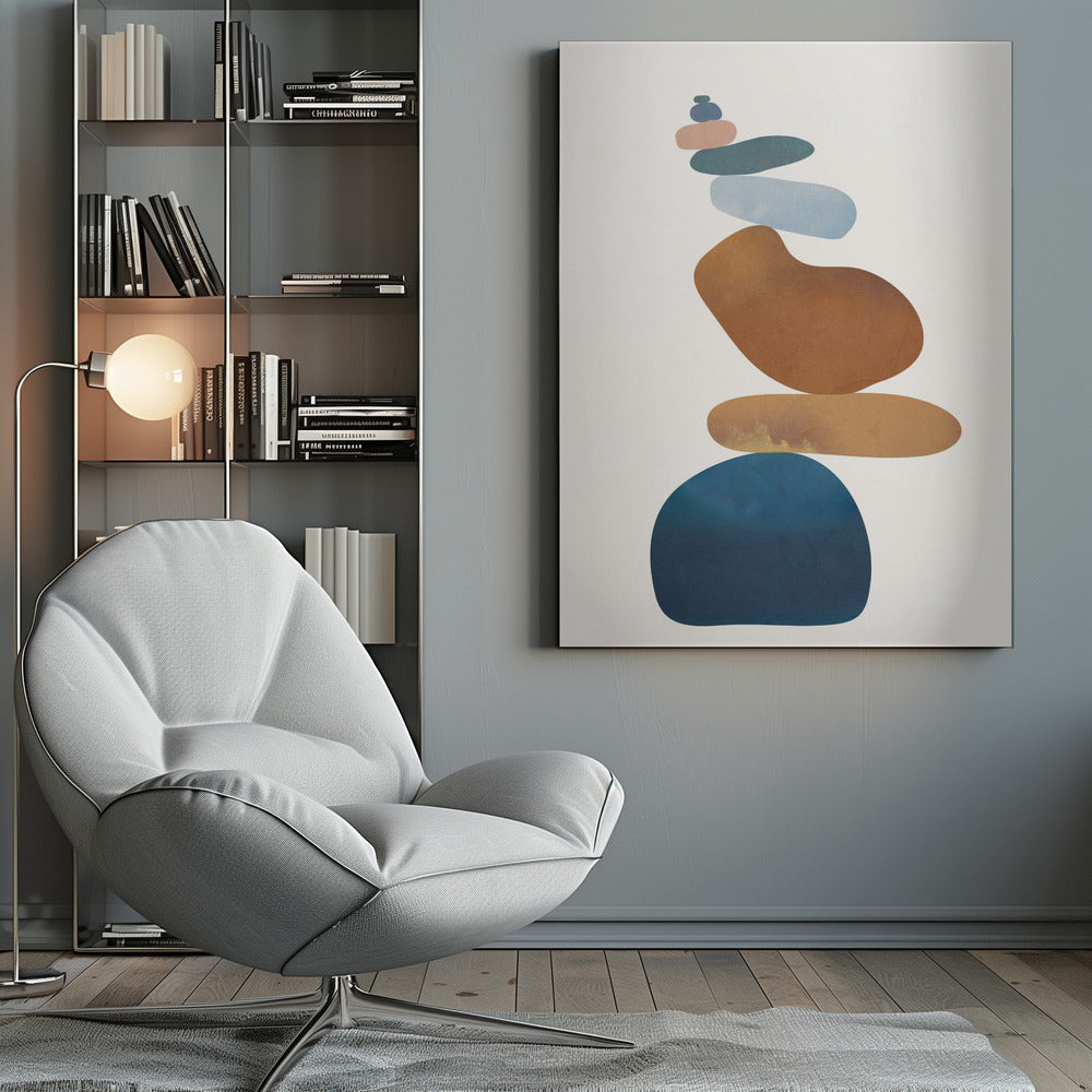 A minimalist abstract painting in a black frame, featuring a precarious stack of colorful, smooth, organic shapes resembling stones against a cream background. The colors range from a large dark blue at the base to brown, ochre, light blue, teal, and pink at the top. Poster