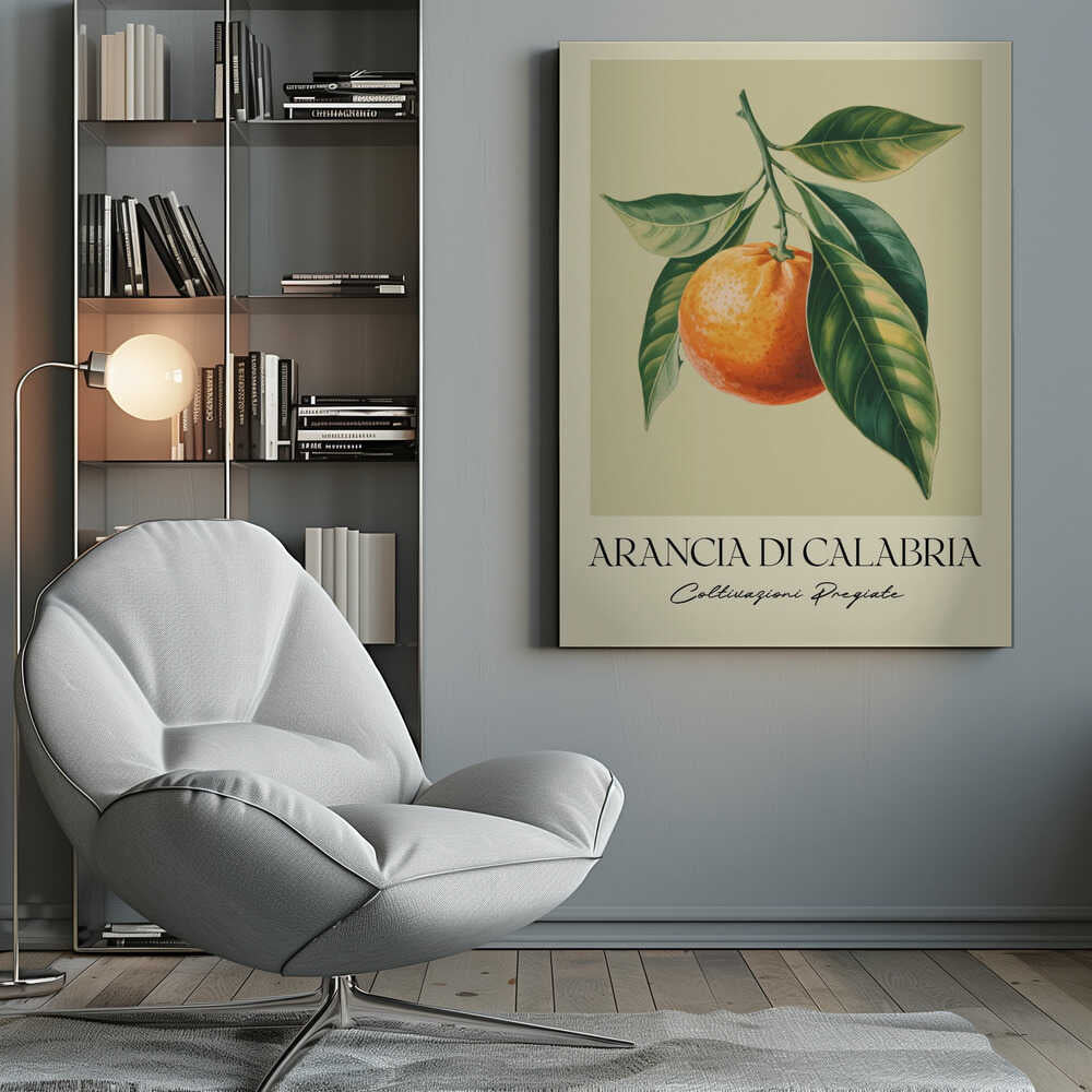 A vintage-style botanical illustration of a ripe orange hanging from a branch with lush green leaves, set against a pale yellow background. Below the image, the text 'ARANCIA DI CALABRIA' is printed in a serif font, with 'Coltivazioni Pregiate' in a script font underneath. The entire print is framed in black. Artwork