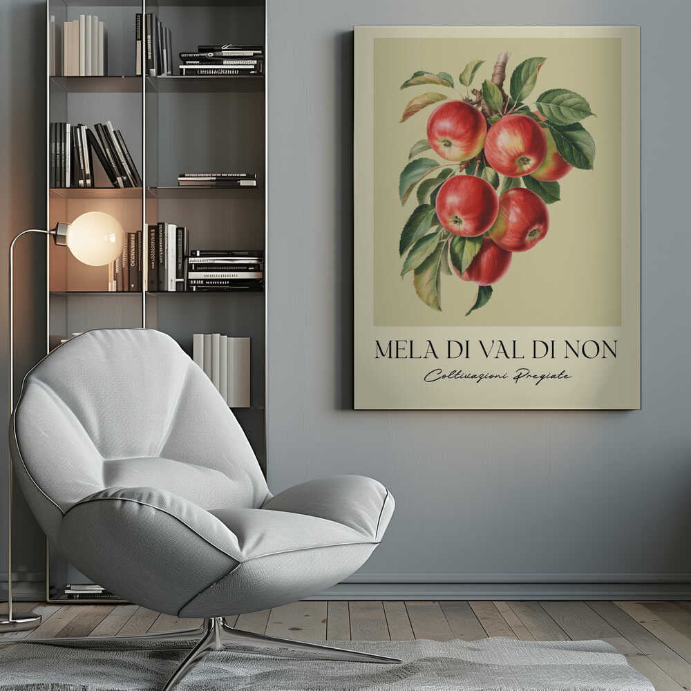 A vintage-style botanical poster featuring a realistic illustration of a cluster of red apples on a branch against a pale yellow-green background. Below the image is the text 'MELA DI VAL DI NON' in a serif font and 'Coltivazioni Pregiate' in a cursive script. The artwork is enclosed in a black frame. Print