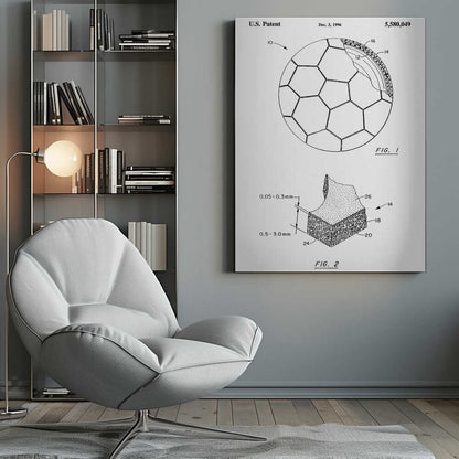 A framed black and white U.S. patent illustration, dated December 3, 1996, for a soccer ball. It features two figures: FIG. 1 shows the full ball with its iconic panel design and a cutaway view of its layers, and FIG. 2 shows a detailed cross-section of the ball's material. Artwork