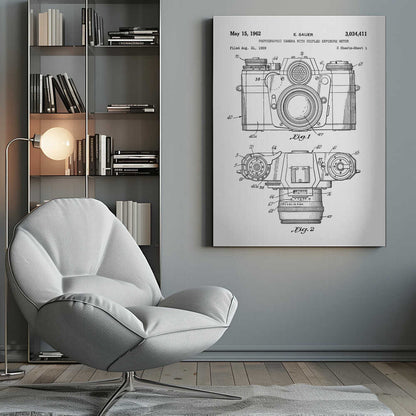 A framed black and white patent illustration of a vintage camera from 1962. It shows two detailed technical drawings, a front view and a top-down view, with numbered parts. Text at the top reads 'May 15, 1962', 'E. SAUER', and the patent number '3,034,411'. Wall Art