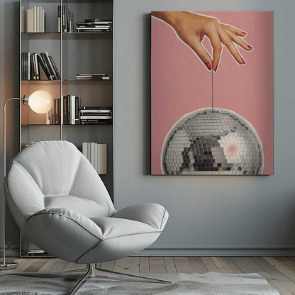 Retro collage art of a hand with red nails holding a silver disco ball against a pink background.