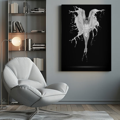 A dramatic black and white photograph of a ballerina suspended in mid-air against a black background. She is en pointe, and a dynamic splash of white liquid surrounds her, creating the illusion of wings. Artwork