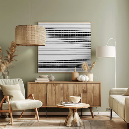A framed abstract artwork featuring black horizontal lines on a white background. The lines vary in thickness and some sections are broken by vertical white spaces, creating a rhythmic and textured pattern. The piece is enclosed in a simple, light-colored wood frame. Poster