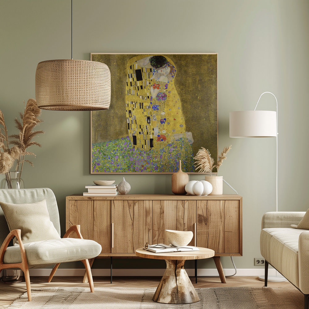 A framed print of Gustav Klimt's famous painting, 'The Kiss'. It features a couple in a passionate embrace, adorned in ornate, patterned golden robes. They are kneeling on a vibrant bed of flowers against a shimmering, textured gold background. Print