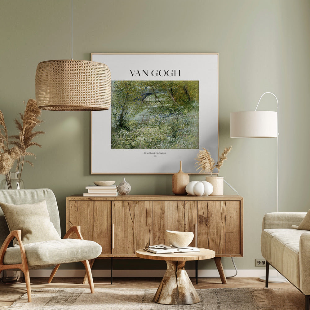 A framed art print of Vincent van Gogh's painting 'River Bank in Springtime'. The impressionist artwork depicts a lush green riverside scene with white flowers and a distant bridge, framed in light wood with a white mat. Wall Art