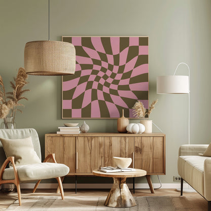 A framed abstract art piece featuring a warped checkerboard pattern in pink and dark olive brown. The grid appears to twist and distort, creating an optical illusion of movement within a light wood frame. Print