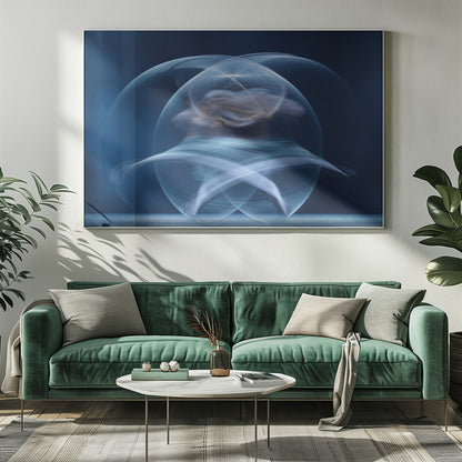 An abstract long-exposure photograph of a spinning dancer, creating ethereal, intersecting trails of blue and white light that form a glowing, orb-like shape against a deep blue background. The image is presented within a silver frame. Poster