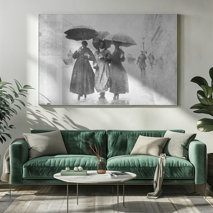 A vintage black and white photograph in a silver frame, depicting three people in long dark coats walking together under umbrellas during a heavy snow or rain storm on a city street. The image has a grainy, textured quality, giving it an old-fashioned, artistic feel. Poster