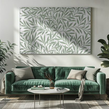 A framed art print with a repeating pattern of sage green leaves and branches on a white background. The style is elegant and inspired by nature, and the print is housed in a simple silver frame. Poster