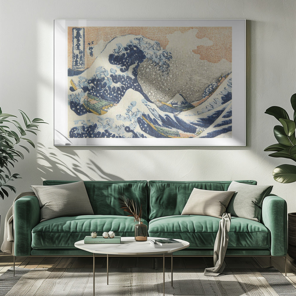 A framed print of Hokusai's 'The Great Wave off Kanagawa,' a Japanese ukiyo-e woodblock print. A huge, dark blue wave with white foam crests over small boats, with a snow-capped Mount Fuji in the distance under a pale orange sky. Artwork